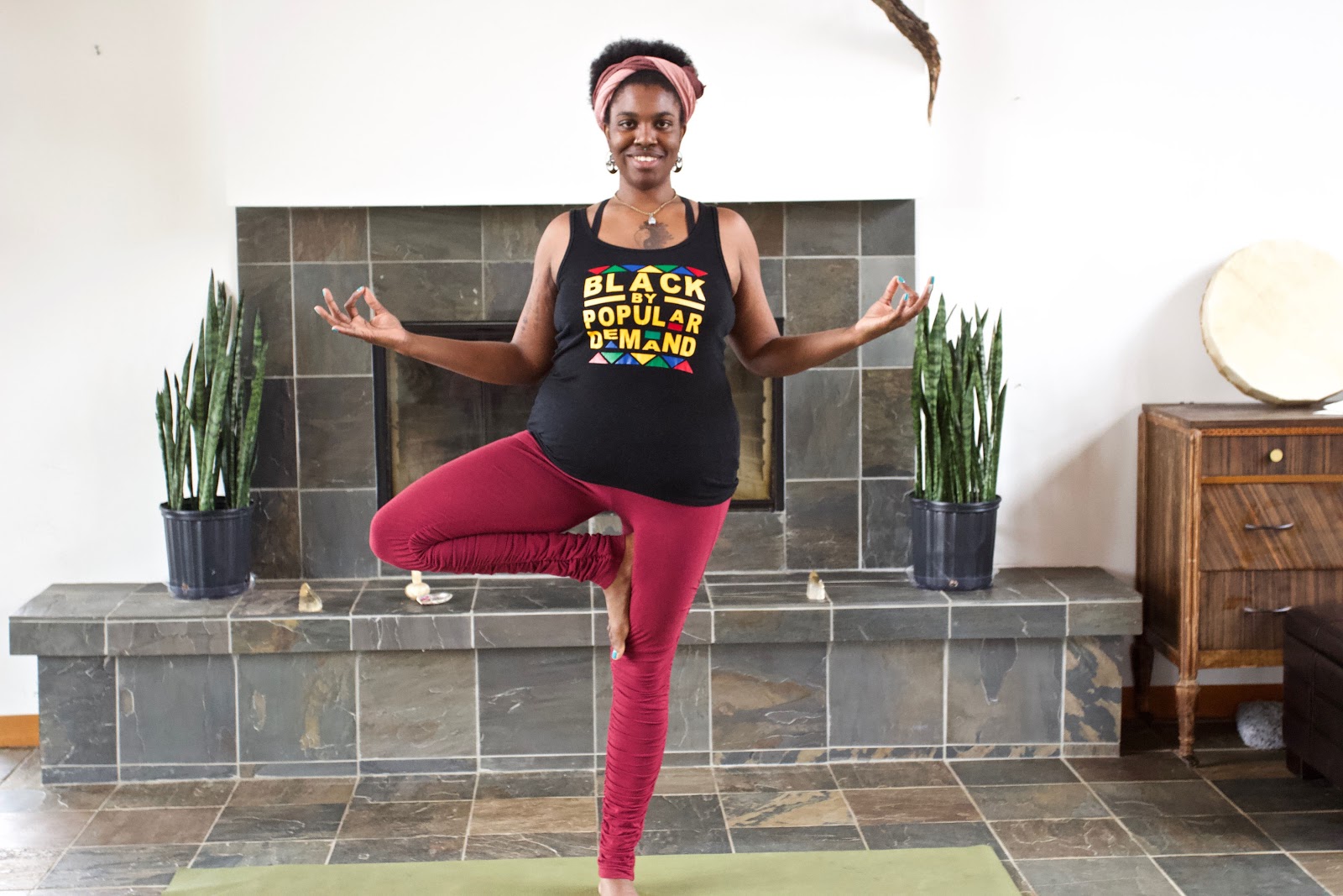 A woman practices yoga