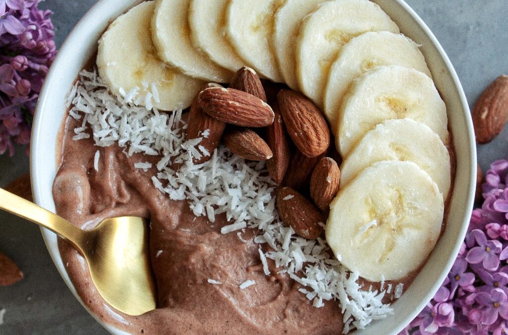 Chai smoothie bowl with banana, coconut, almonds